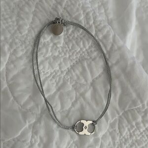 Tory Burch Silver Embrace Ambition Bracelet on Card